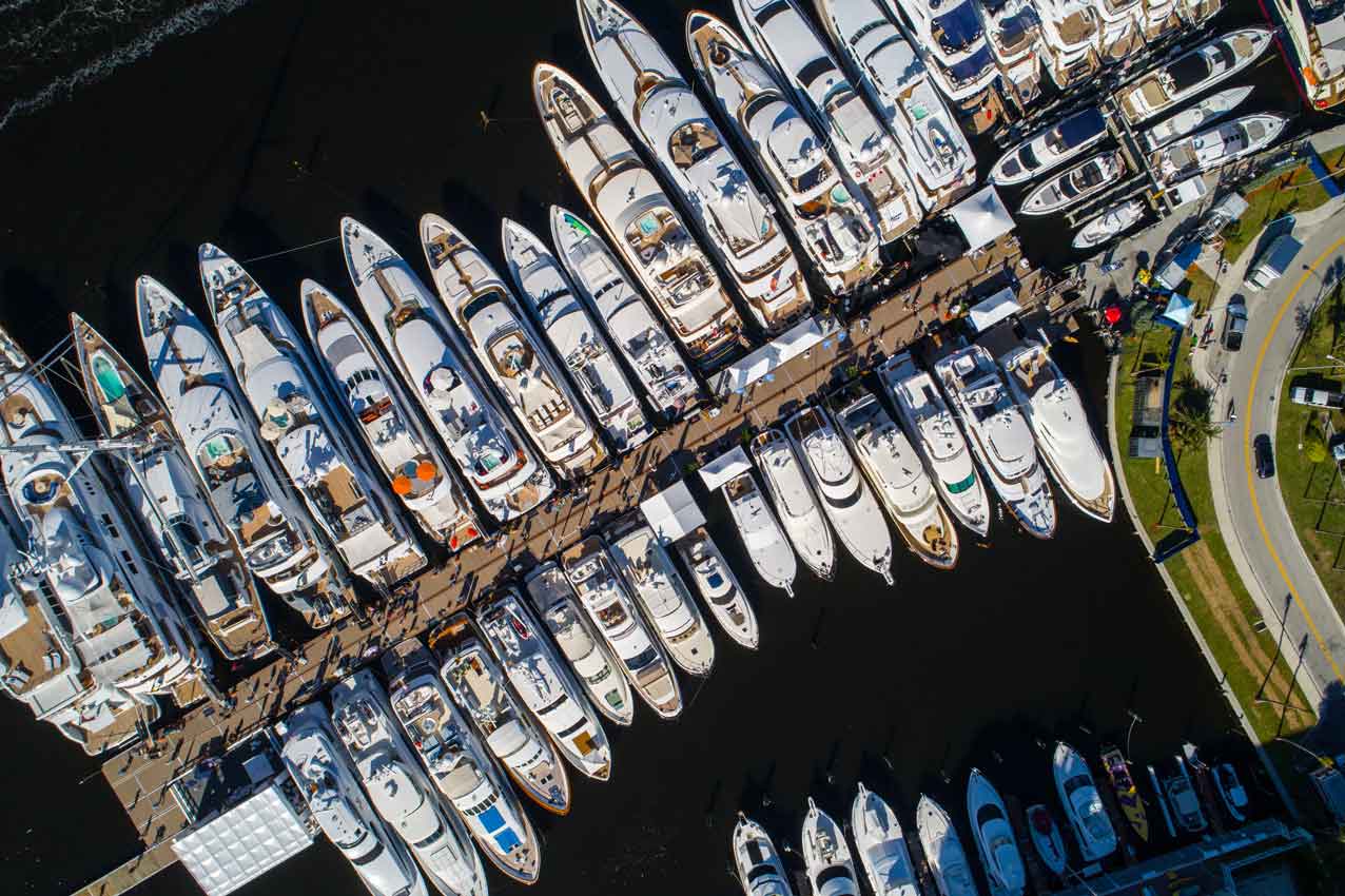 aerial view of a crowded marina with parked boats of all sizes