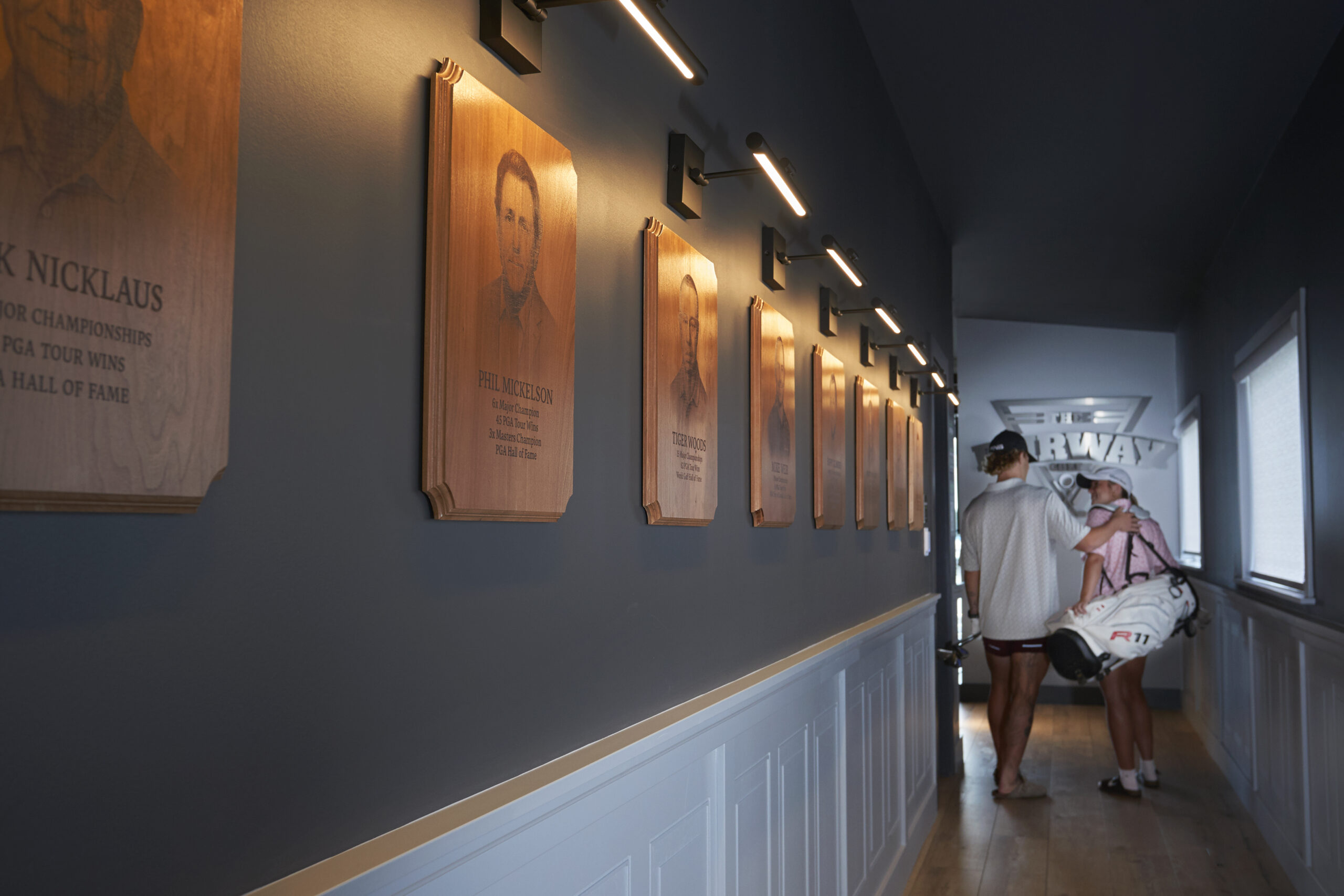 Hallway to The Fairway indoor golf simulator at Crate Marine Belleville